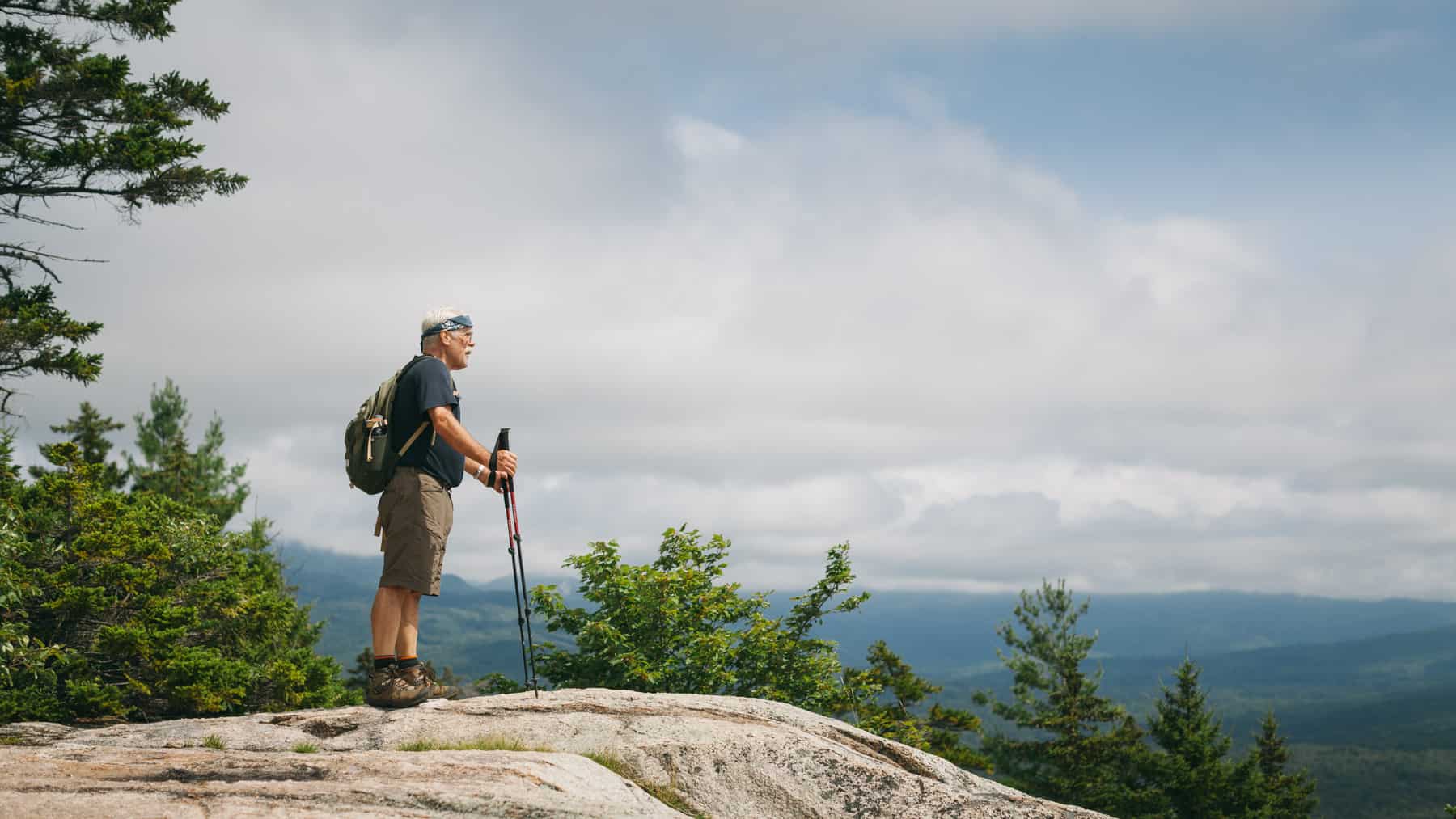 A Hiker looks out from the summit of Hedgehog Mountain