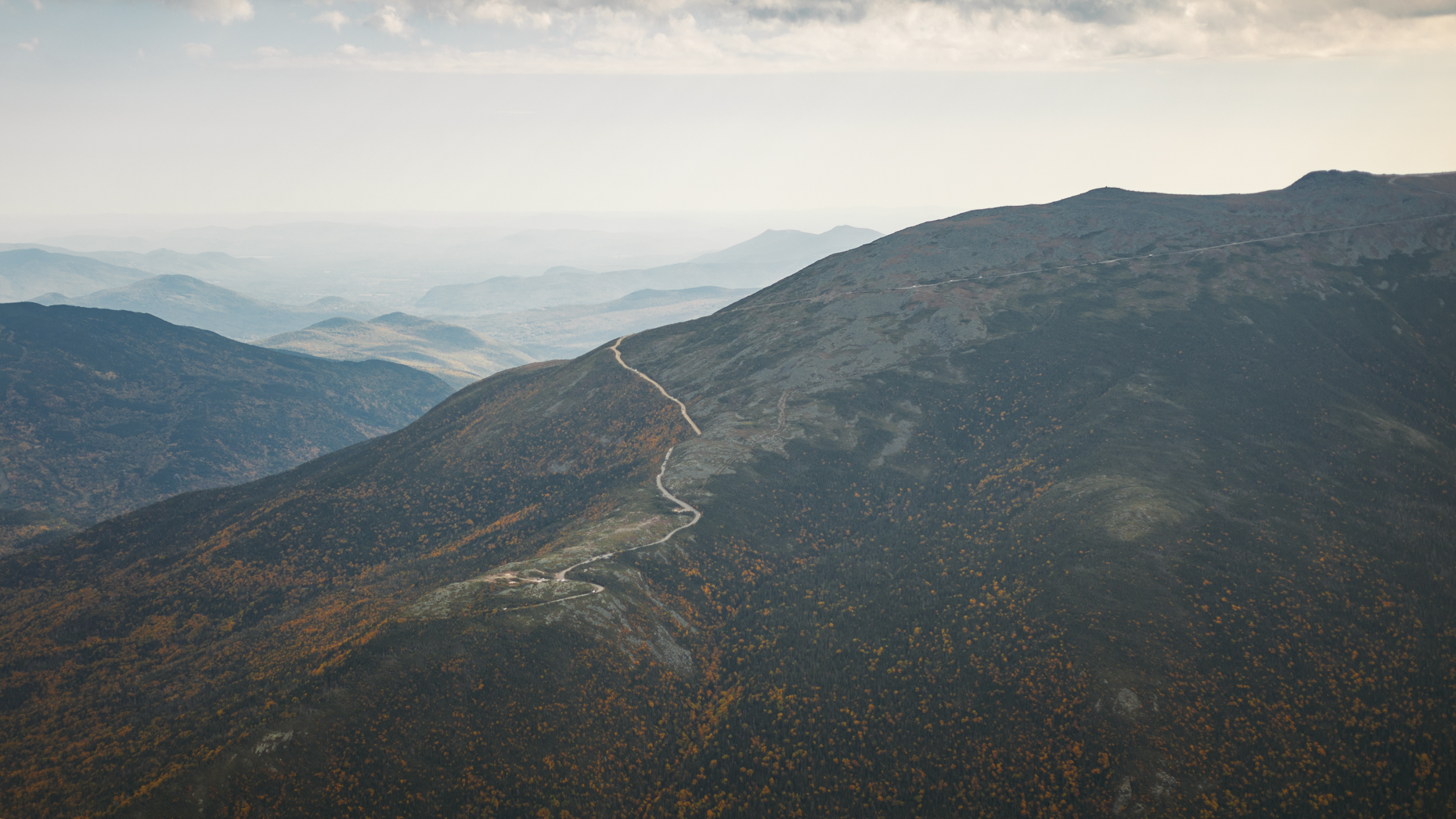 A view of the Mount Washington Auto Road as view from the summit of Mount Adams.